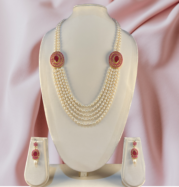 Ruparna - Enticing oval pearls dual brooch multi line pearl necklace set